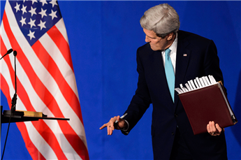 Secretary of State John Kerry leaves the stage at the Swiss Federal Institute of Technology in Lausanne, Switzerland, on April 2, 2015. AP